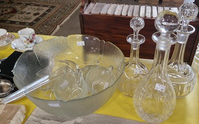 Lot 437 - Three assorted cut glass decanters together...