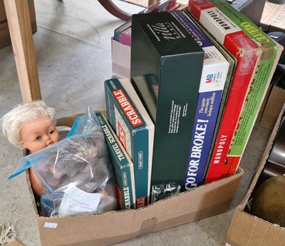 Lot 514 - A box of assorted child's toys and boardgames...