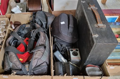 Lot 519 - Two boxes of assorted camera equipment to...