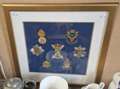 Lot 650 - A framed montage of seven assorted Regimental...