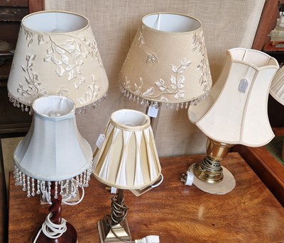 Lot 687 - Three pairs of assorted table lamps together...