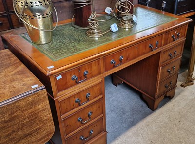 Lot 688 - A reproduction yew wood pedestal desk with...