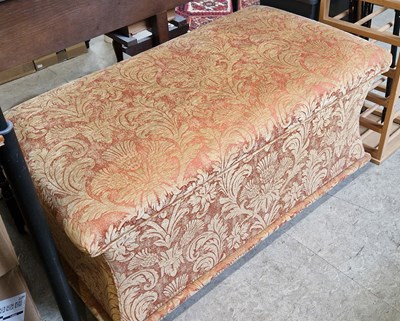 Lot 690 - An upholstered ottoman of rectangular form...