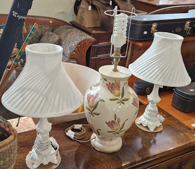 Lot 693 - A pair of white composite table lamps and...