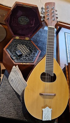 Lot 418 - A vintage 48 Key concertina in fitted mahogany...