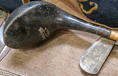 Lot 504 - A collection of assorted vintage golf clubs to...