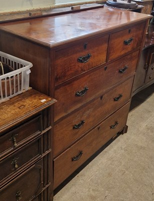 Lot 671 - A late 19th century walnut chest of two short...