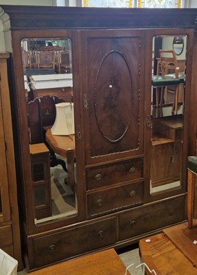 Lot 714 - An early 20th century mahogany wardrobe, the...