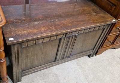 Lot 715 - A 20th century stained oak coffer, the hinged...