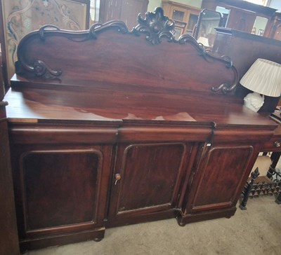 Lot 692 - A 19th century mahogany inverted breakfront...