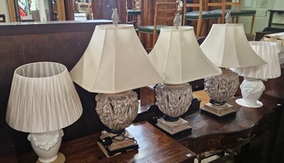 Lot 724 - Three decorative composite table lamps and...