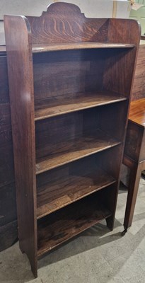 Lot 725 - An early 20th century oak open bookcase of...