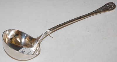 Lot 122 - A Victorian silver soup ladle, London 1875,...