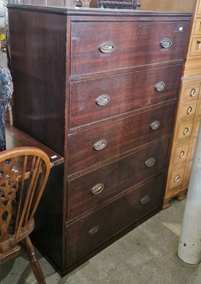 Lot 712 - An early 20th century oak tall chest fitted...