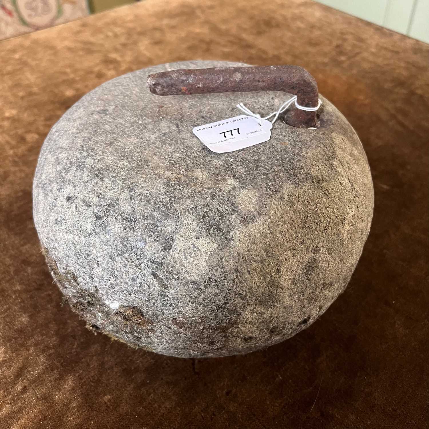 Culing Stone Numbers Lot 777 - An antique curling stone.