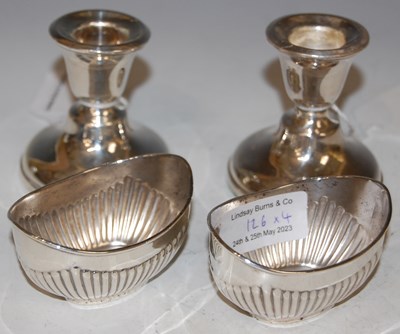 Lot 126 - A pair of Birmingham silver candle stands and...