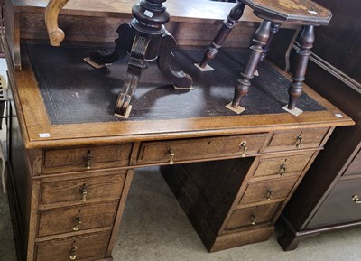 Lot 763 - A late 19th century oak desk, 125cm wide.