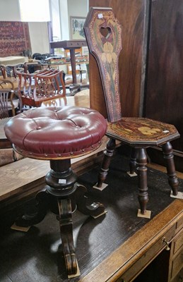 Lot 764 - A Victorian revolving piano stool with red...