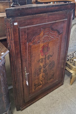 Lot 772 - A 19th century oak hanging corner cupboard,...