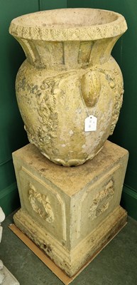 Lot 779 - A fire clay garden urn on associated fire clay...