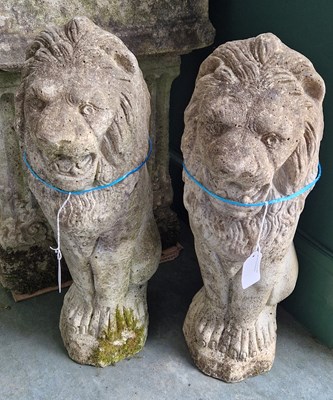 Lot 783 - A pair of reconstituted stone ornamental...