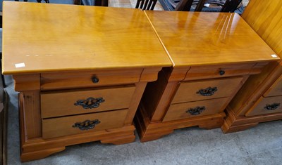 Lot 721A - A pair of blonde wood bedside cabinets, each...