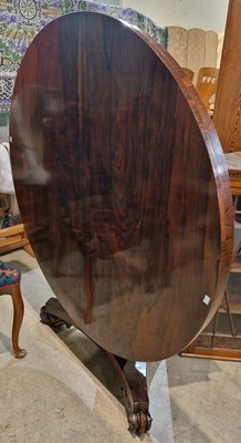 Lot 829 - A late 19th century rosewood circular snap-top...