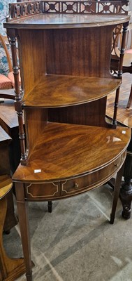 Lot 834 - A reproduction mahogany corner stand with...