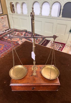 Lot 500 - A set of mahogany and brass measuring /...