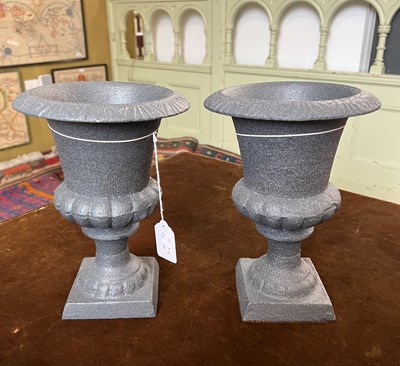 Lot 498 - A pair of decorative cast metal urns of...