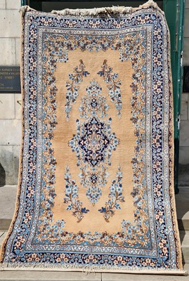 Lot 883 - A pair of Cafe Au Lait ground Persian rugs,...