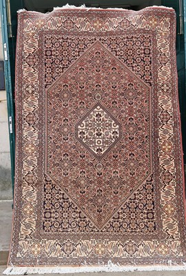 Lot 915 - A Persian rug, 20th century, the rectangular...