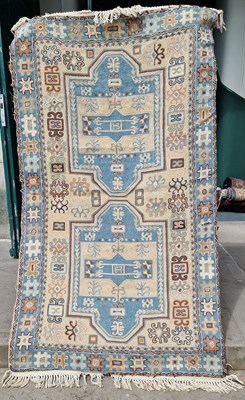 Lot 868 - Two small Persian rugs, one with a madder...