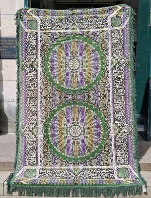 Lot 867 - A green ground Persian style rug / wall...