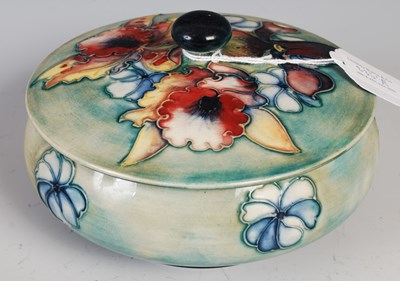 Lot 235A - A Moorcroft pottery green ground circular...