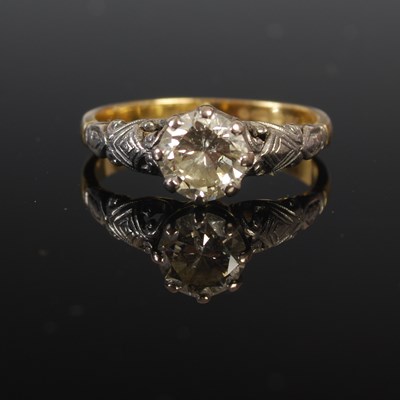 Lot 208A - An 18ct gold and diamond solitaire ring, the...