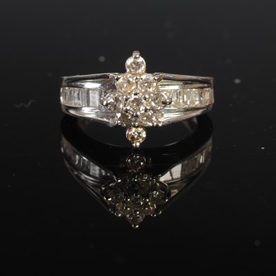 Lot 208E - A white metal and diamond cluster ring,...