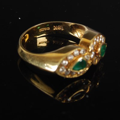 Lot 208 - An 18ct gold emerald and diamond double...