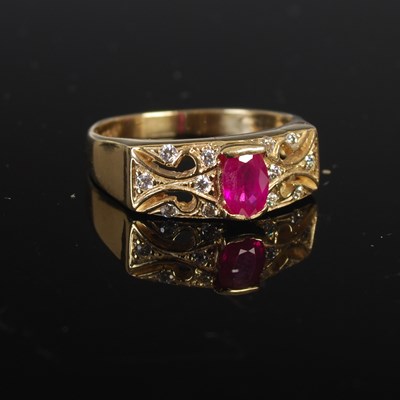 Lot 208N - A 9ct gold ruby and diamond chip ring, size 'P'...