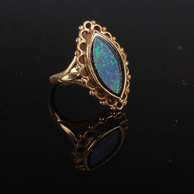 Lot 208P - A 9ct gold oval shaped opal doublet ring, size...