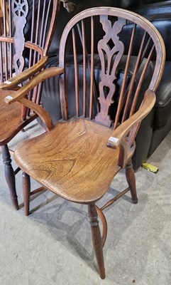 Lot 759 - An Antique Windsor type arm chair with pierced...