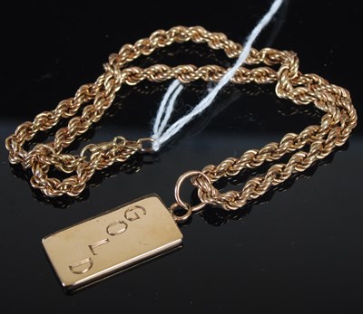 Lot 210K - A 9ct gold necklace, 13.2g, suspending a...