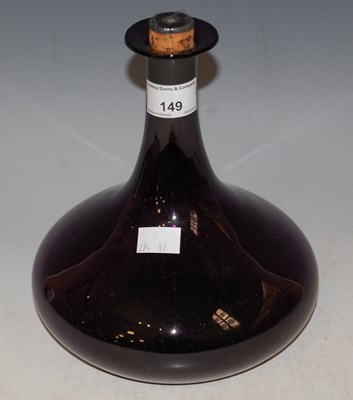 Lot 149 - A 19th century purple glass decanter and cork...