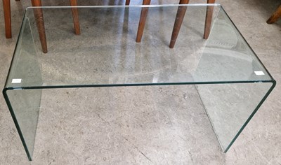 Lot 773 - A clear glass coffee table, 46.5 cm high x 85...