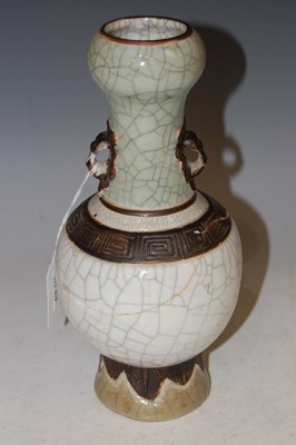 Lot 151 - A Chinese porcelain crackle glazed bottle vase,...