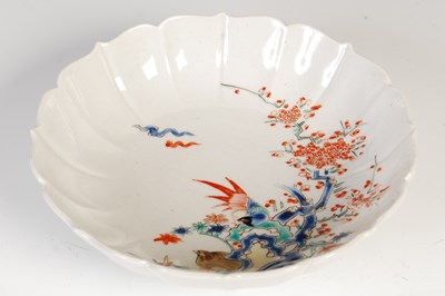 Lot 569 - An antique Japanese Kakiemon flower shaped...