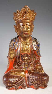 Lot 545 - A Chinese gilt bronze figure of Guanyin, late...