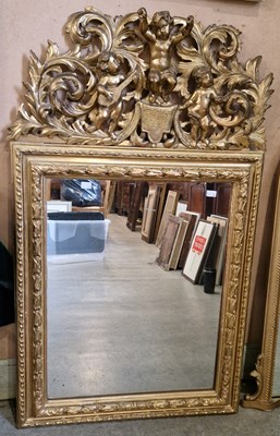 Lot 686 - An Antique giltwood rectangular wall mirror...