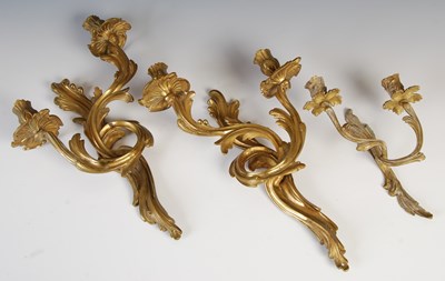 Lot 170 - A pair of Rococo style ormolu two light wall...