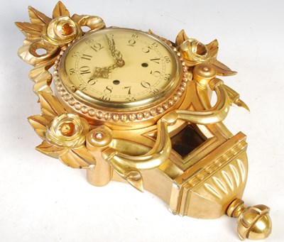 Lot 367 - A 20th century gilt wood wall clock, the...